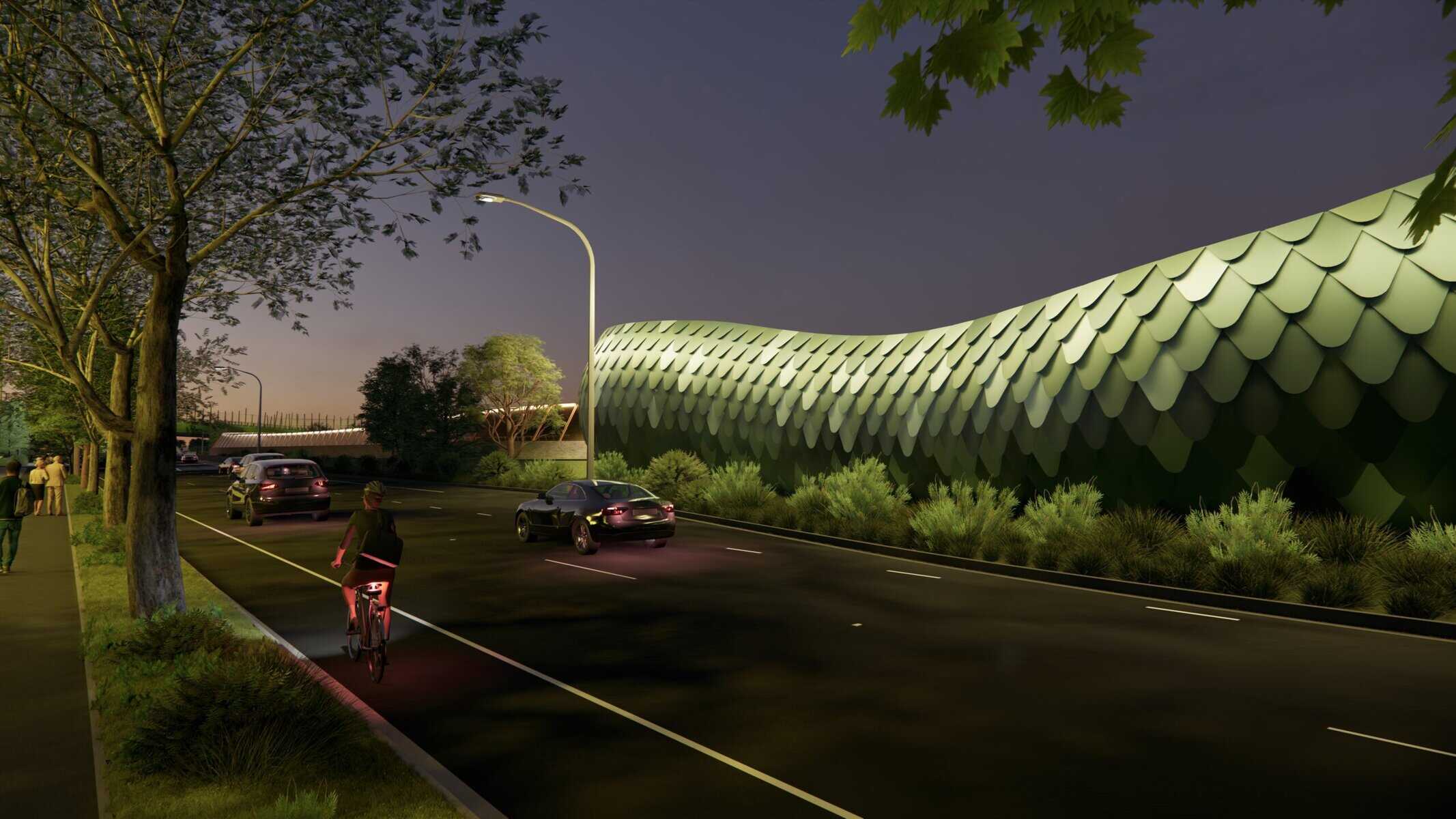 Panneau architectural innovant en forme de vague verte sur une route urbaine la nuit.