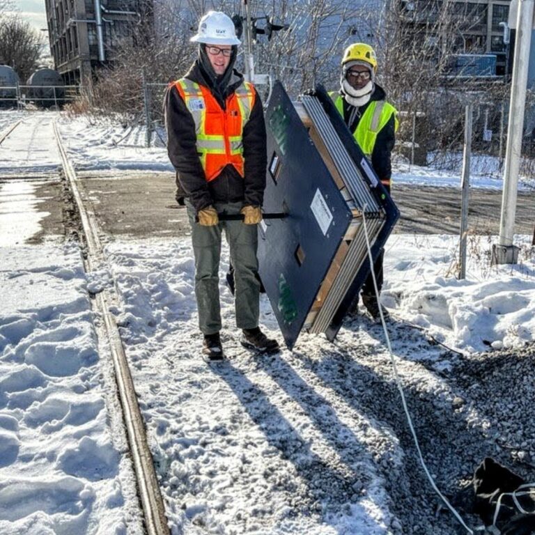 Team UBY Installing SAAX by the railroad